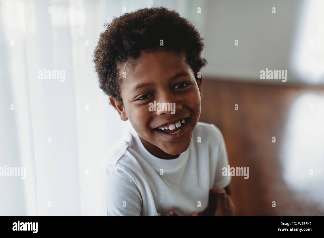 Portrait of school-aged boy looking at camera Banque D'Images