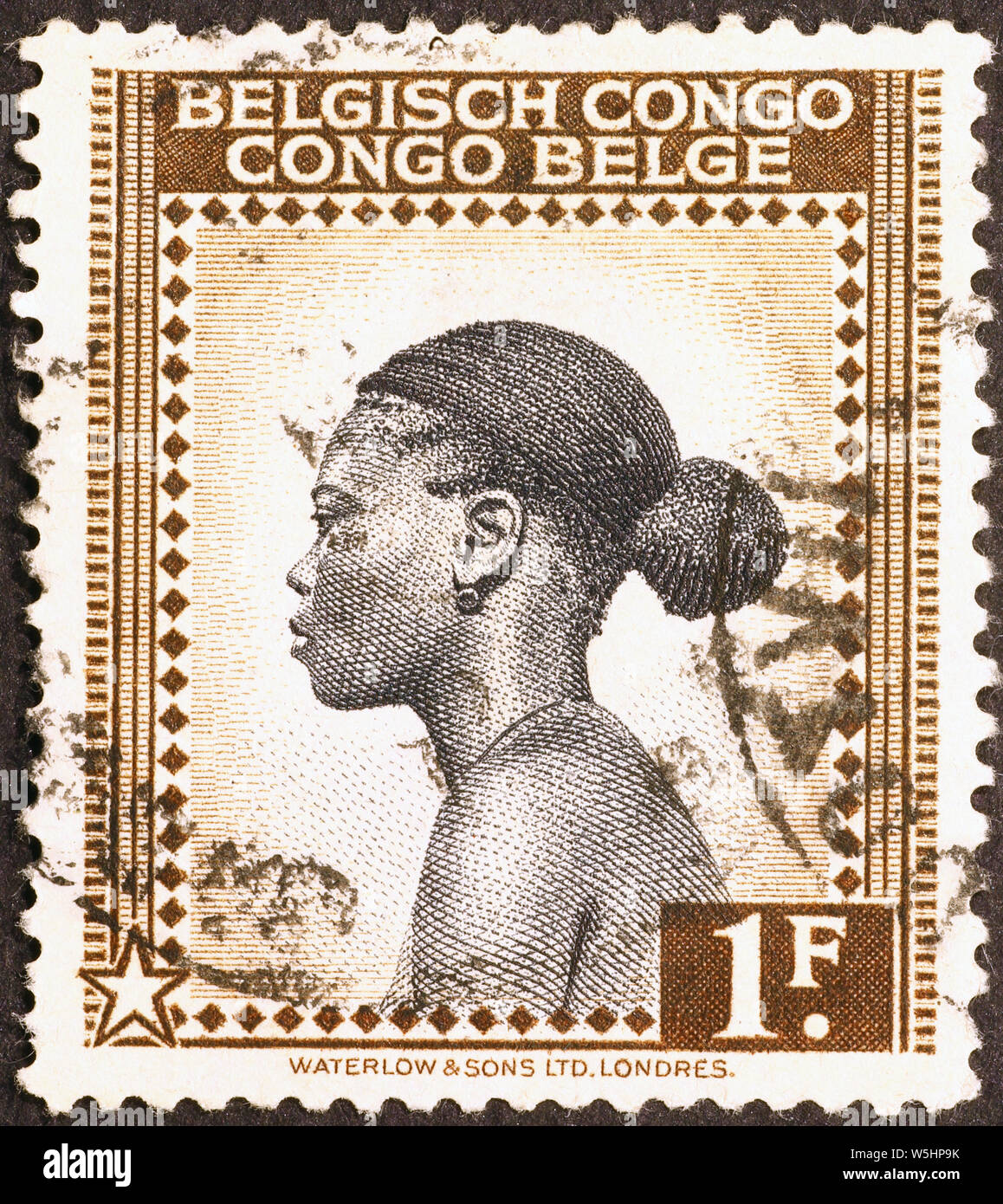 Femme de profil sur timbres-poste du Congo Belge Banque D'Images