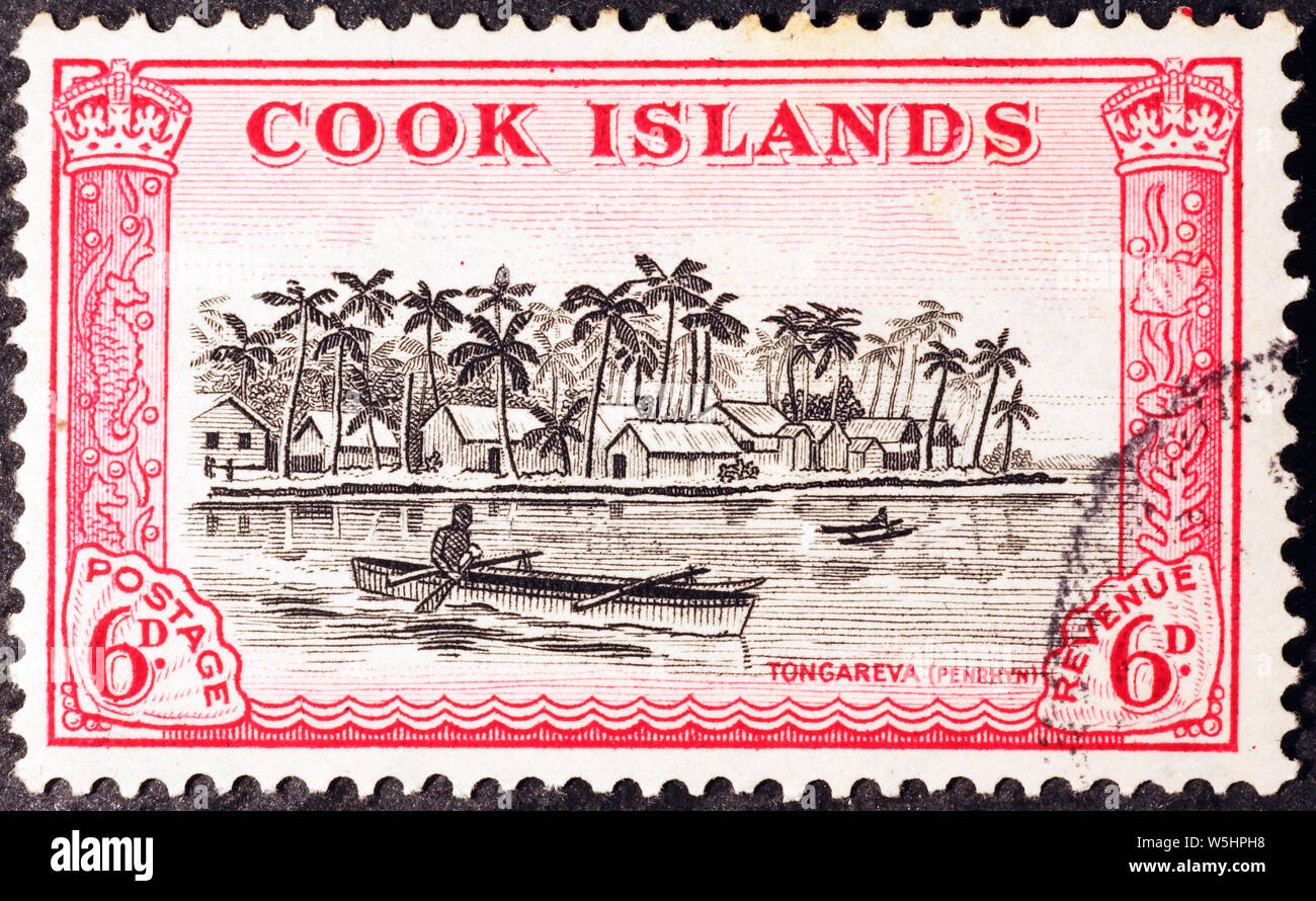 Village indigène sur les vieux timbres-poste des îles Cook Banque D'Images