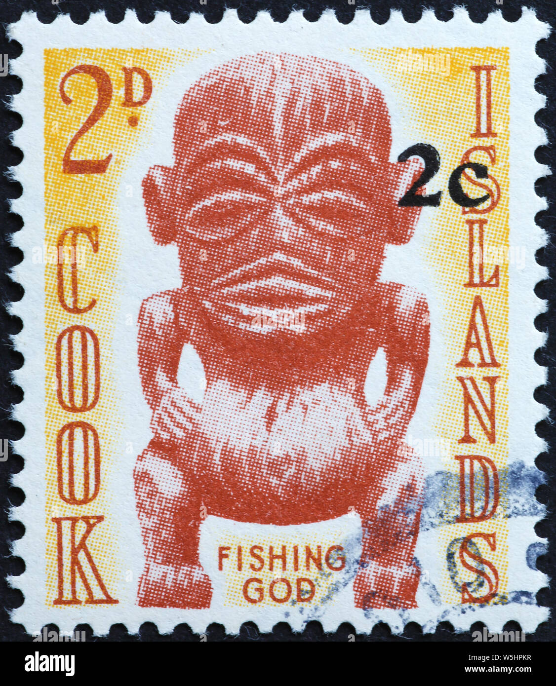 Statue du dieu de la pêche sur l'horodateur de Îles Cook Banque D'Images