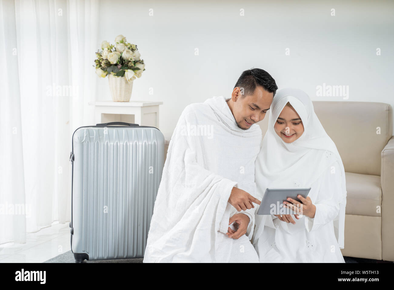 Famille musulmane la préparation d'assurance avant le hadj Banque D'Images