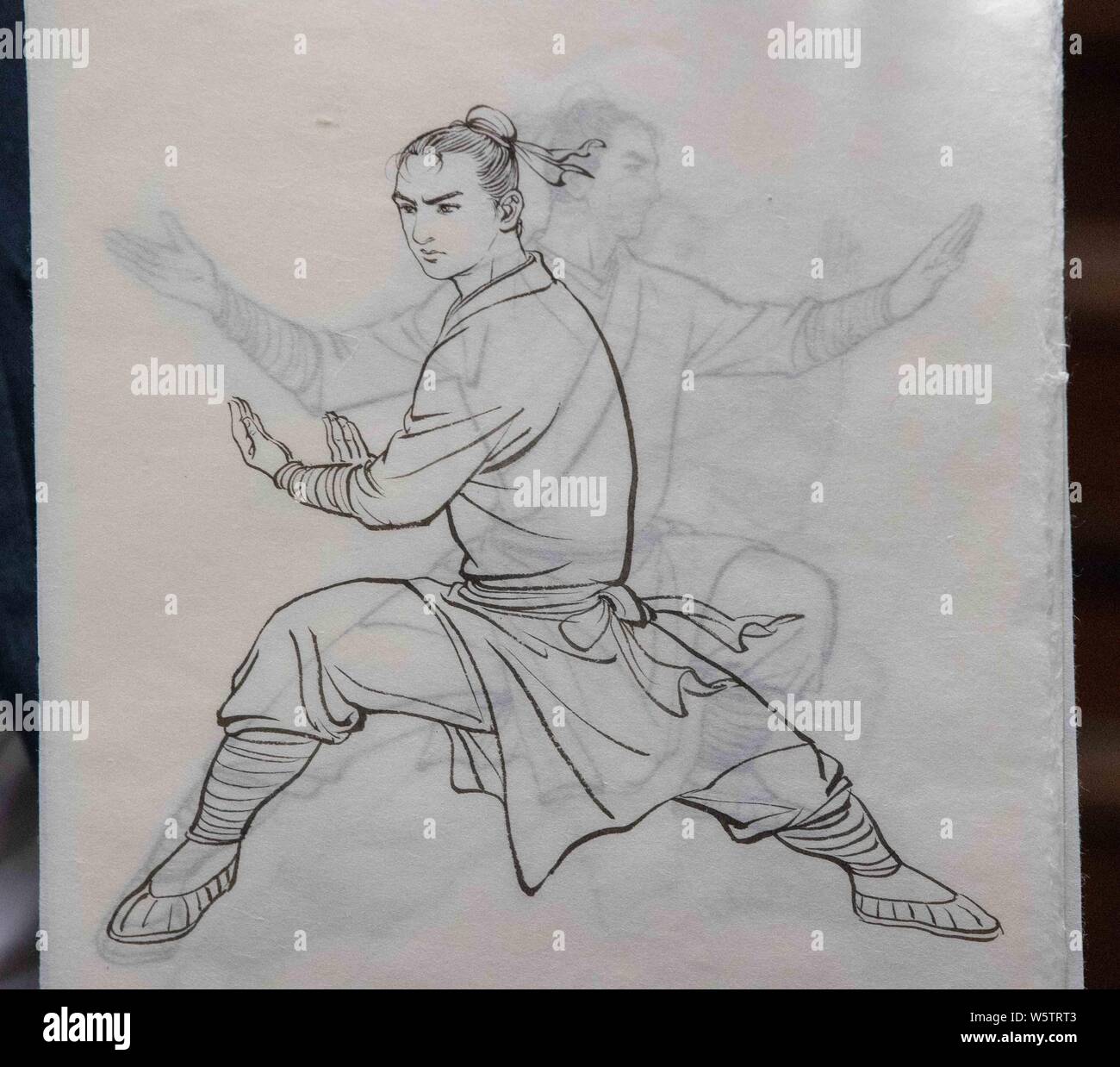Les manuscrits de timbres spéciaux sur le thème de la 'personnages dans les romans de Jin Yong" sont affichés dans une succursale de Hongkong Post à Hong Kong, Chine, 3 Banque D'Images