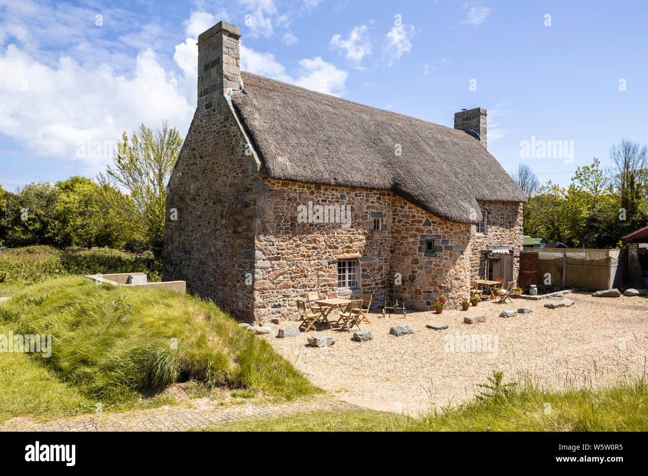 L'architecture typique de l'île - les caches vieille ferme datant du 15ème siècle, Les Villets, Guernsey, Channel Islands UK Banque D'Images