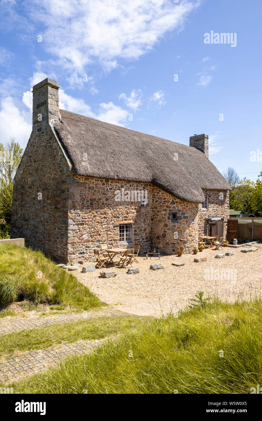 L'architecture typique de l'île - les caches vieille ferme datant du 15ème siècle, Les Villets, Guernsey, Channel Islands UK Banque D'Images