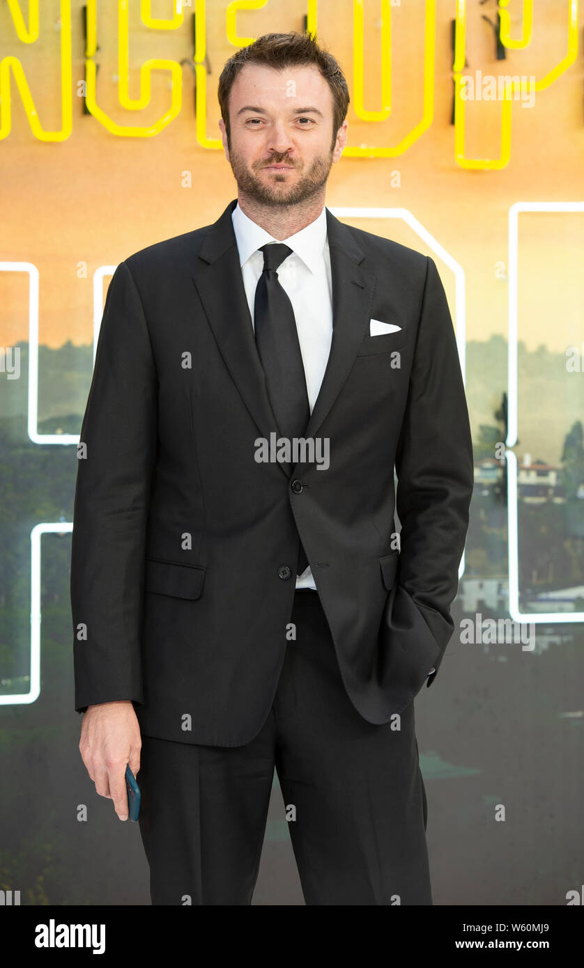 Londres, ANGLETERRE - 30 juillet 2019 : Costa Ronin assiste à la première UK de 'Il était une fois à Hollywood, Luxe Odeon Leicester Square, Londres, Angleterre. Gary Mitchell/ Alamy Live News. Banque D'Images