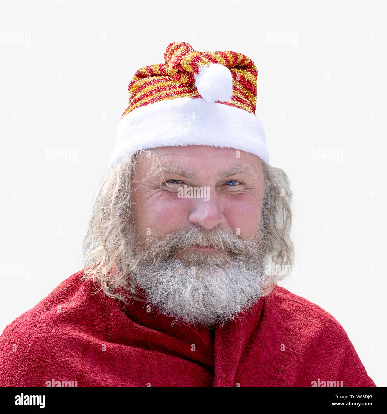 Portrait of a smiling man charismatique avec une barbe habillé en père Noël Banque D'Images