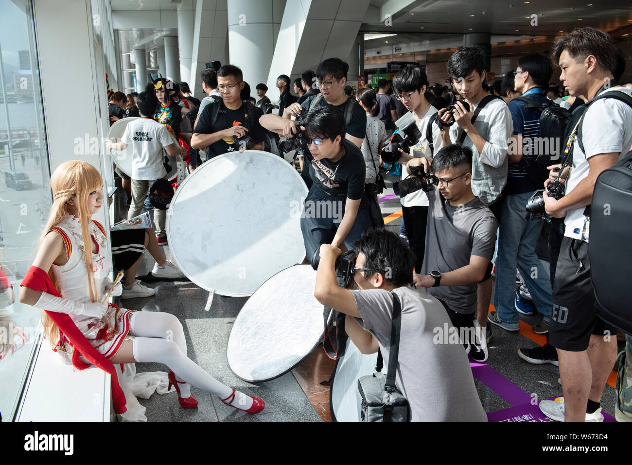 Photographes amateurs et fans de cosplay cosplayeur photographe en caractère au cours de l'ani-com et l'E-sport et Music Festival à Hong Kong. Banque D'Images