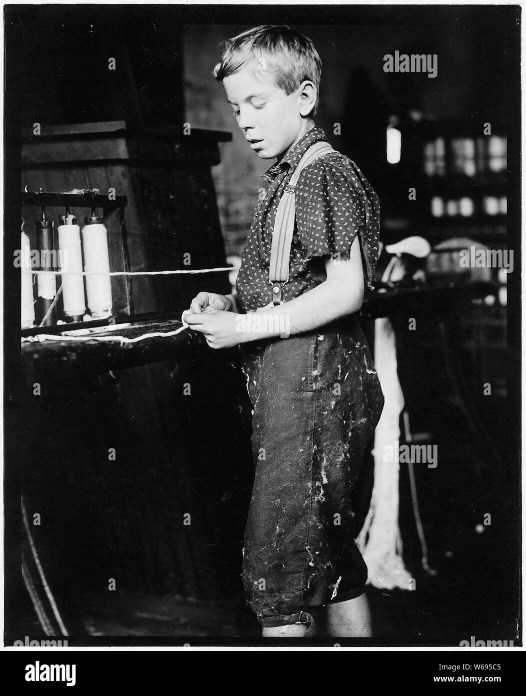 Bandes de jeunes, usine de coton Clarence Noel, 11 ans. North Pownal, Vermont Banque D'Images