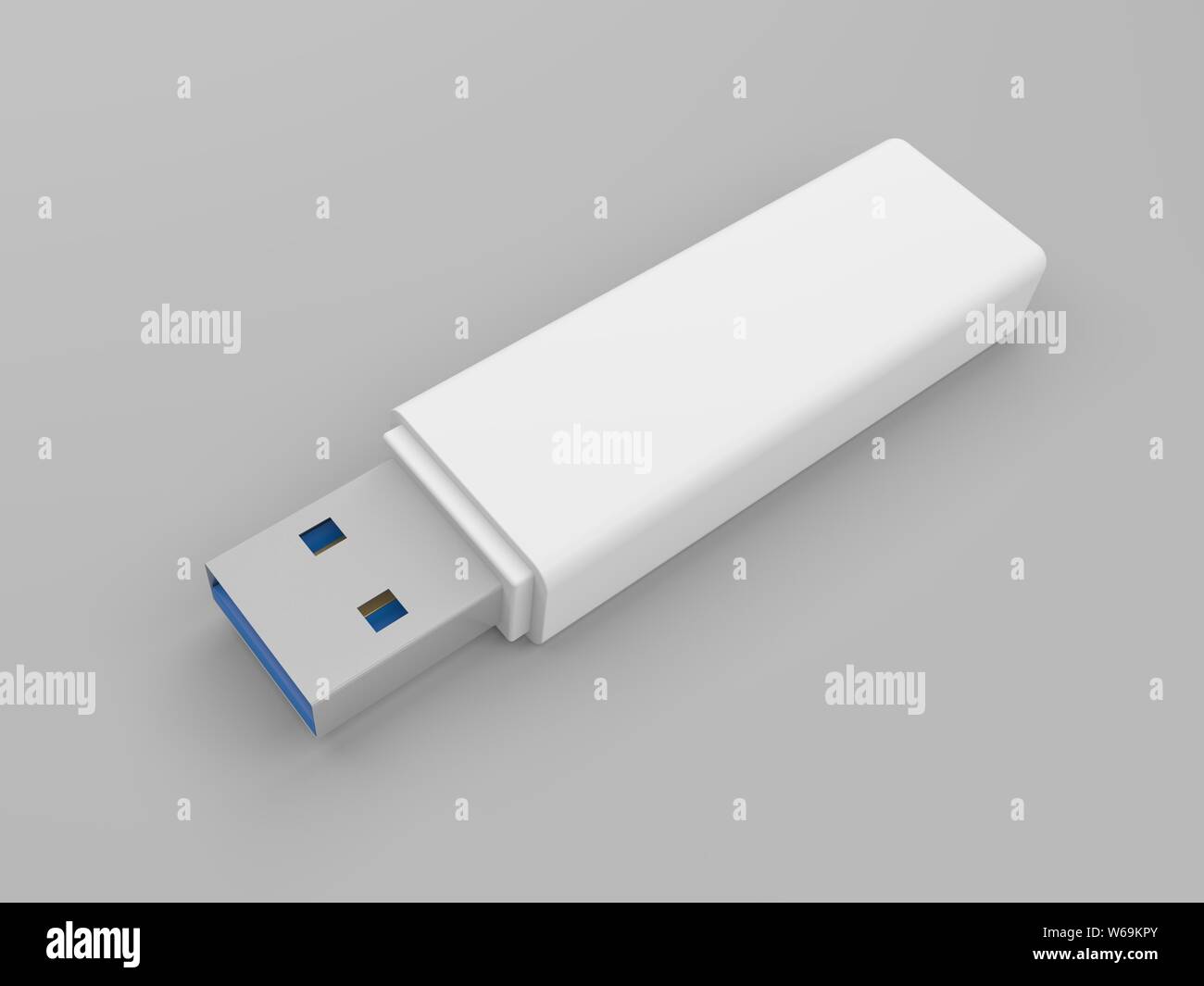 Lecteur flash USB blanc isolé sur fond blanc. Banque D'Images