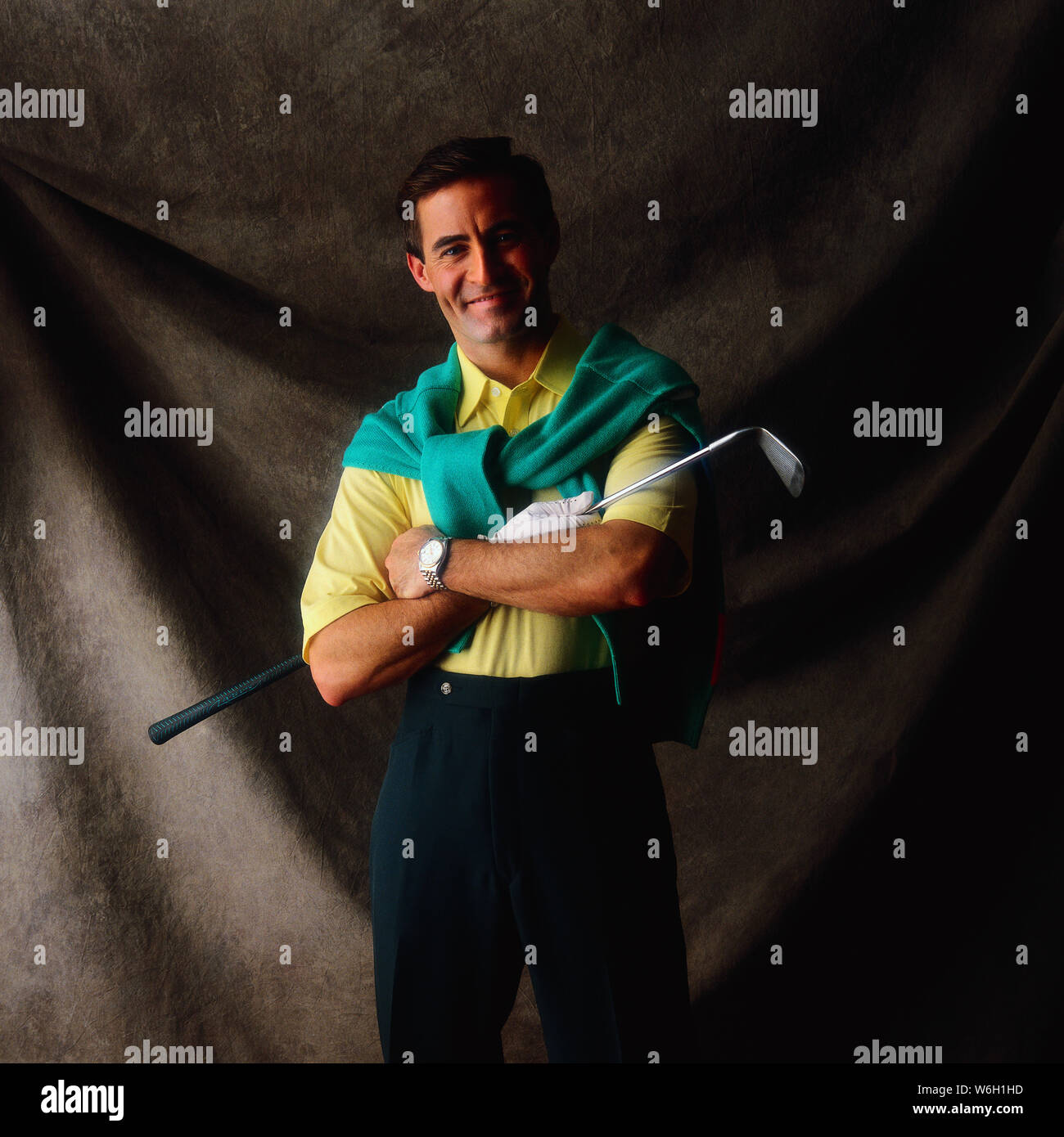 Homme dans une tenue de golf Banque D'Images