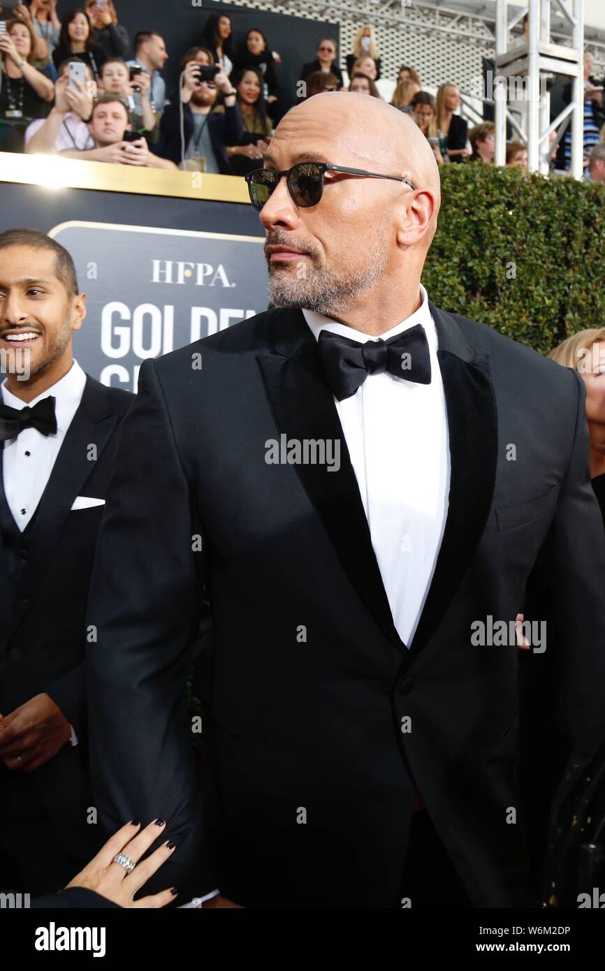 Acteur américain acteur américain Dwayne 'The Rock' Johnson arrive sur le tapis rouge pour le 75e Golden Globe Awards à Los Angeles, Californie, États-Unis, 7 Banque D'Images