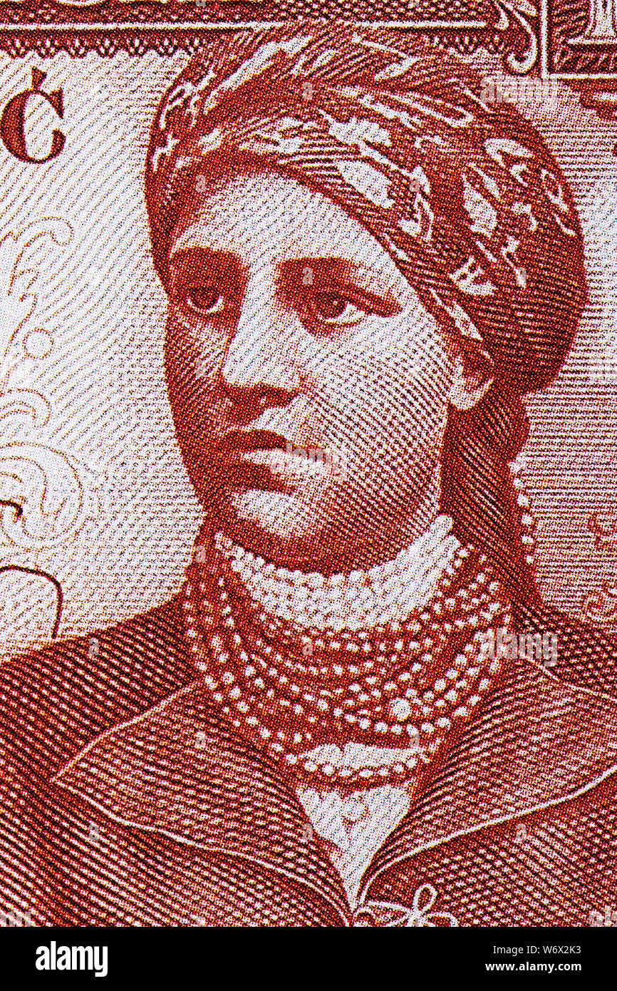 Portrait d'une jeune femme dans un foulard de l'ancien d'origine polonaise Banque D'Images