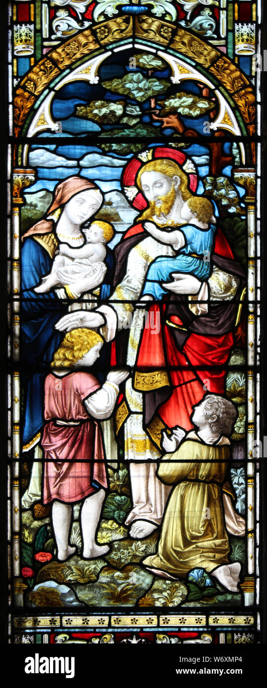 Détails sur la fenêtre Bapistry - 'Jésus bénissant les enfants' vitraux dans l'église Holy Trinity, Llandudno Banque D'Images