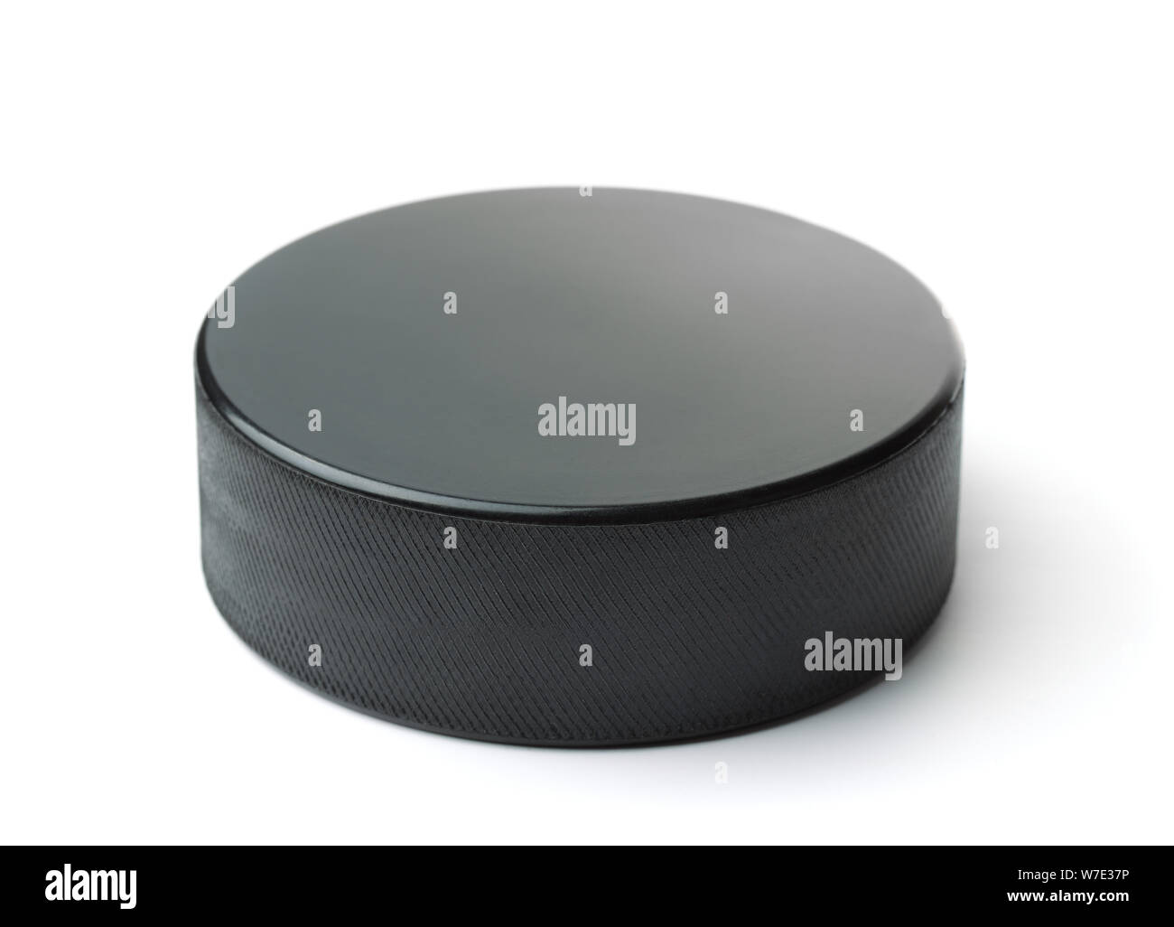 Black Ice hockey puck isolated on white Banque D'Images