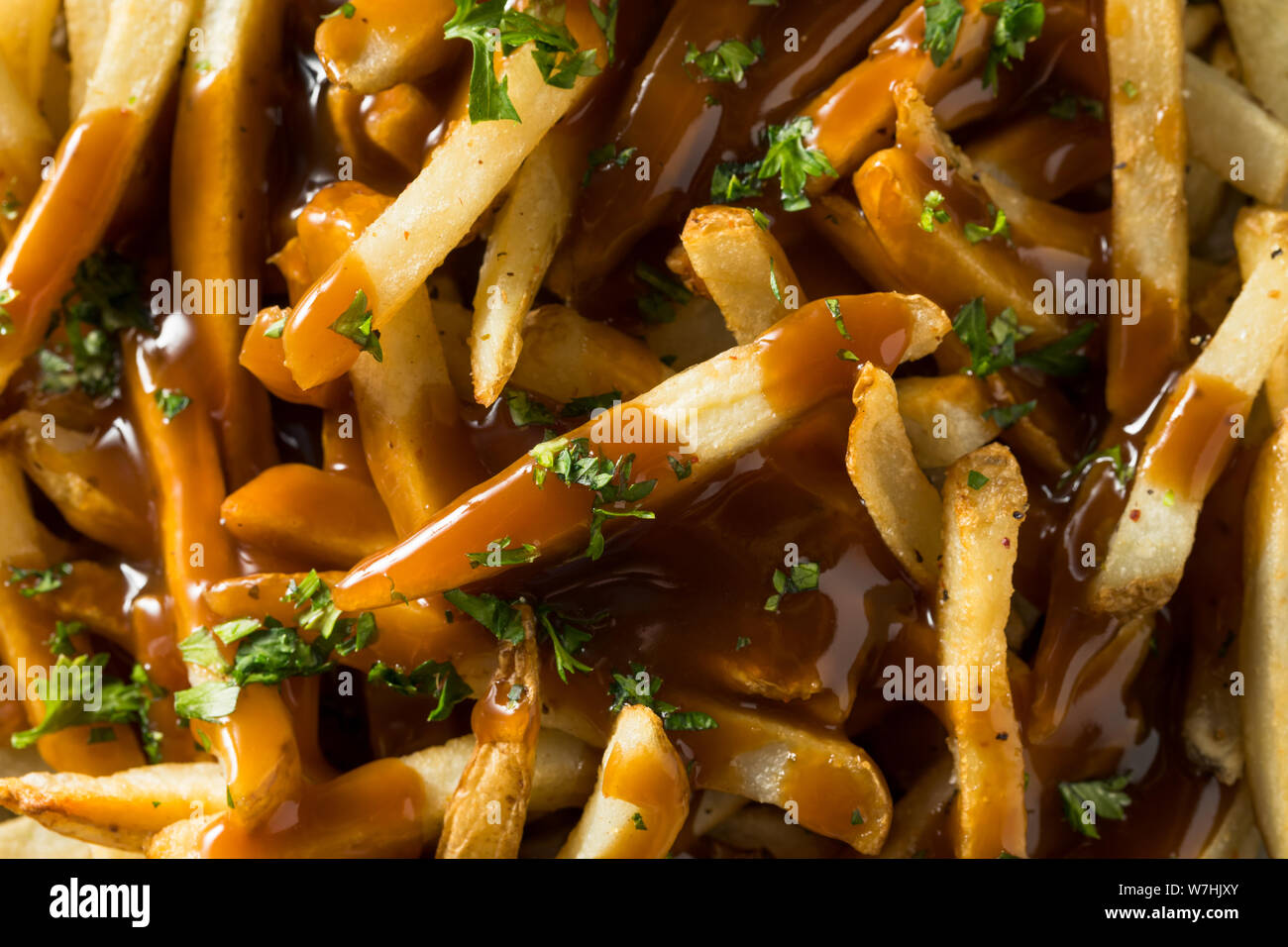 Des frites sauce américaine avec sel et poivre Banque D'Images