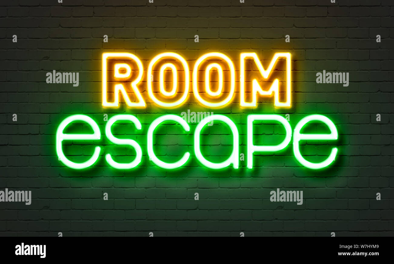 Room Escape en néon sur fond brique Banque D'Images