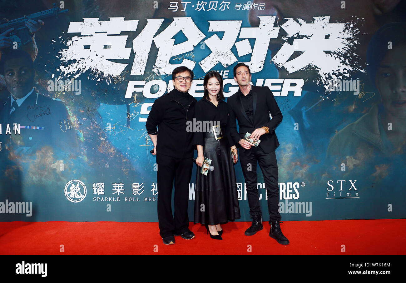 (De gauche) kungfu Hong Kong star Jackie Chan, l'actrice chinoise Liu Tao, et l'Acteur et producteur Adrien Brody arrivent sur le tapis rouge pour le Banque D'Images