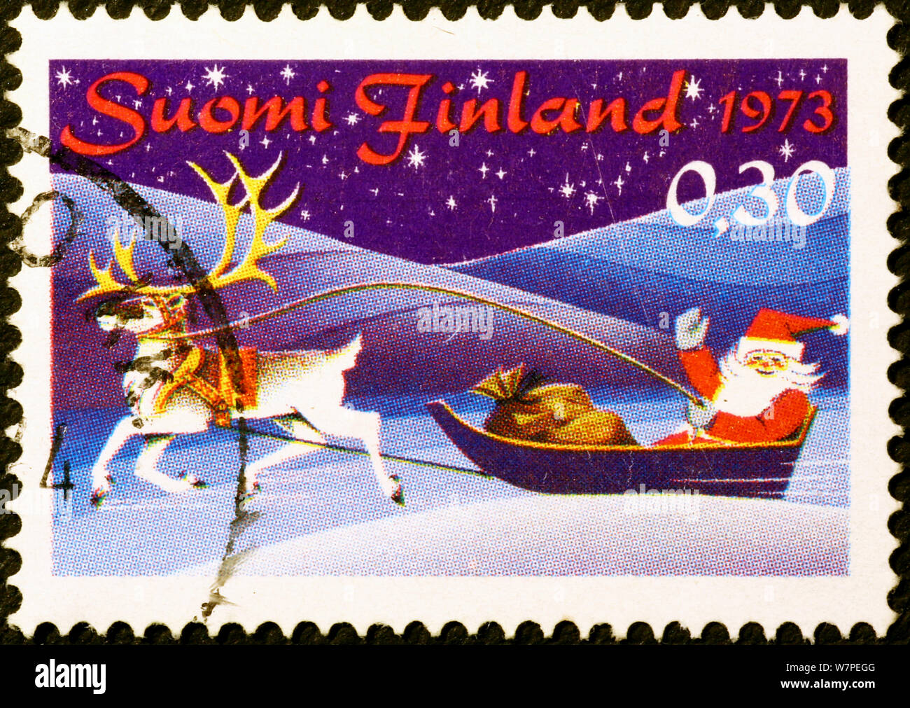 Père Noël sur son traîneau en timbre finlandais Banque D'Images