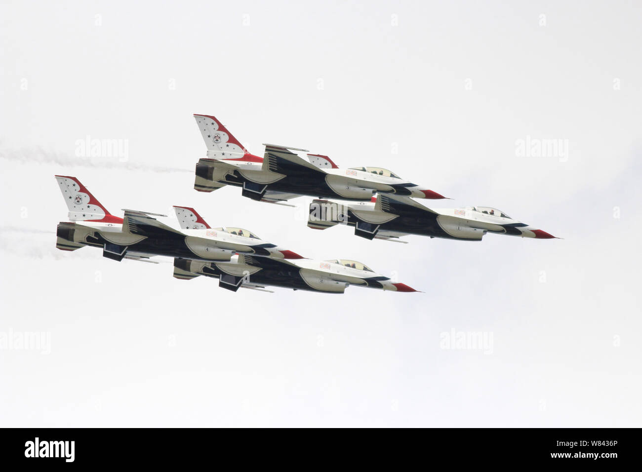 Quatre avions de voltige des Thunderbirds stunt dans un show aérien Banque D'Images