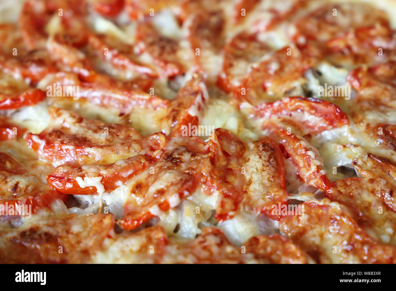 Arrière-plan de la pizza, du graphique avec le fromage, la viande et les tomates closeup Banque D'Images