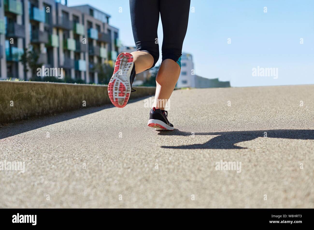 Jogging femme, faible section. Banque D'Images Jogging femme, faible section. Banque D'Images