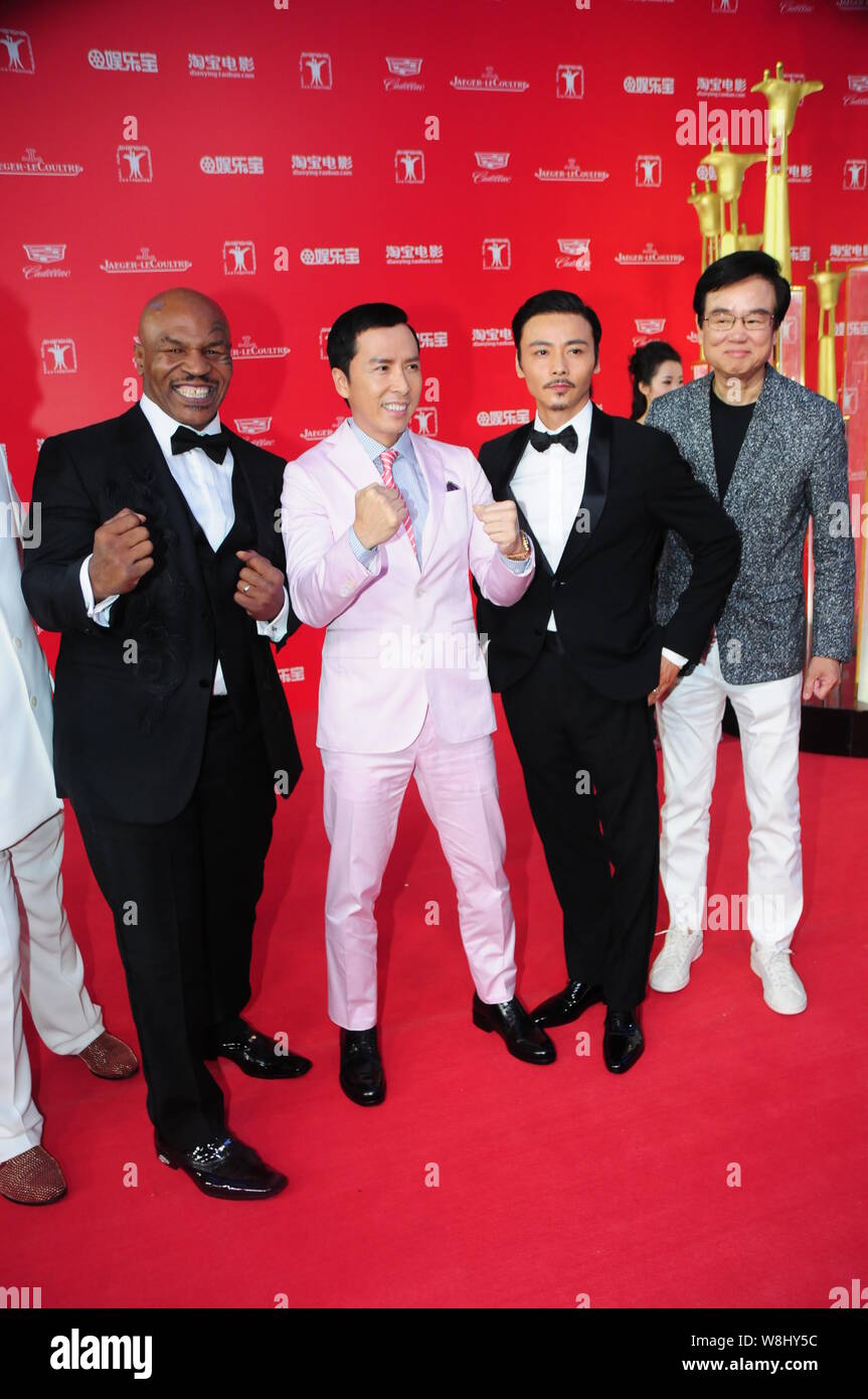 (De gauche) a pris sa retraite boxeur américain Mike Tyson, Hong Kong l'acteur Donnie Yen, l'acteur chinois Zhang Max et Hong Kong film producteur Bak-Ming Wong posent sur Banque D'Images