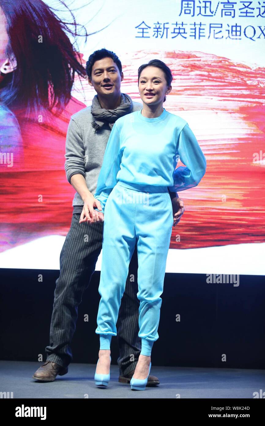 L'actrice chinoise Zhou Xun, avant, et son mari l'acteur américain Archie Kao poser lors d'un événement pour la premiere micro film 'Dream' échapper pour promouvoir I Banque D'Images