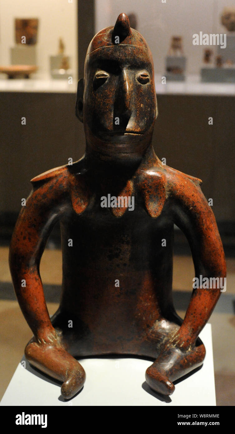 Navire figurant un homme assis. Céramique peinte. Colima style. Ancien et Moyen/ période Classique (100-700 AD). L'ouest du Mexique. Musée de l'Amérique. Madrid, Espagne. Banque D'Images