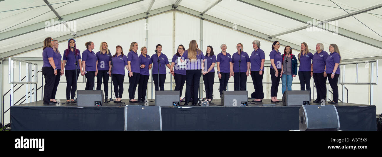Le fort George, Inverness, Écosse, 10 août, 2019. Les membres de l'Inverness les épouses de militaires de la scène chorale à Historic Scotland's Festival au fort manifestation organisée pour célébrer 250 ans de Fort George. Banque D'Images
