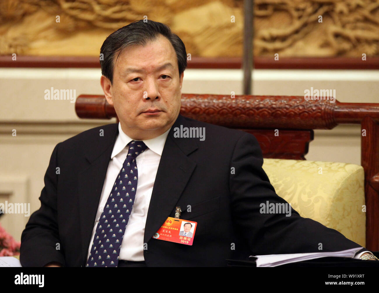 --FILE--Xia Yi Feng, gouverneur de la province de Zhejiang, réagit lors d'une conférence de presse le jour des médias dans le Grand Hall du Peuple, au cours des deux sessions Banque D'Images