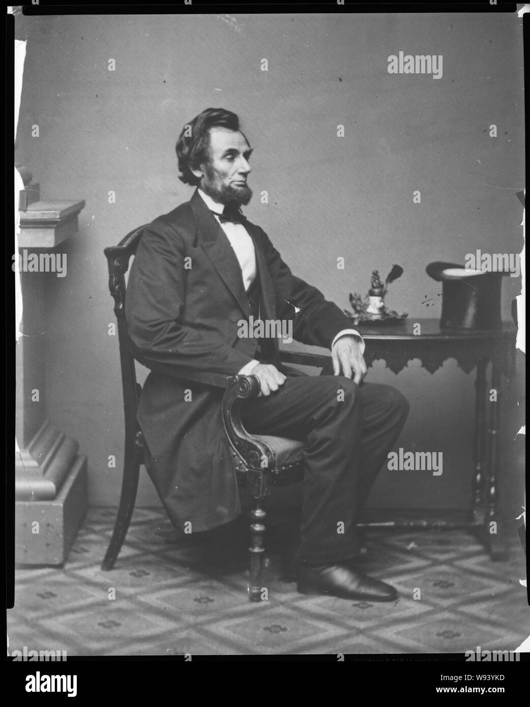 Abraham Lincoln, portrait en pied, assis Banque D'Images