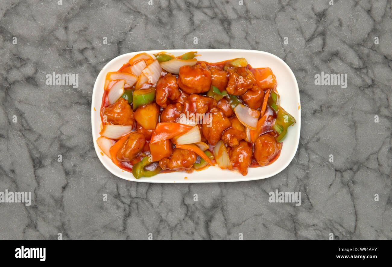 La cuisine chinoise. Poulet avec sauce aigre-douce Banque D'Images