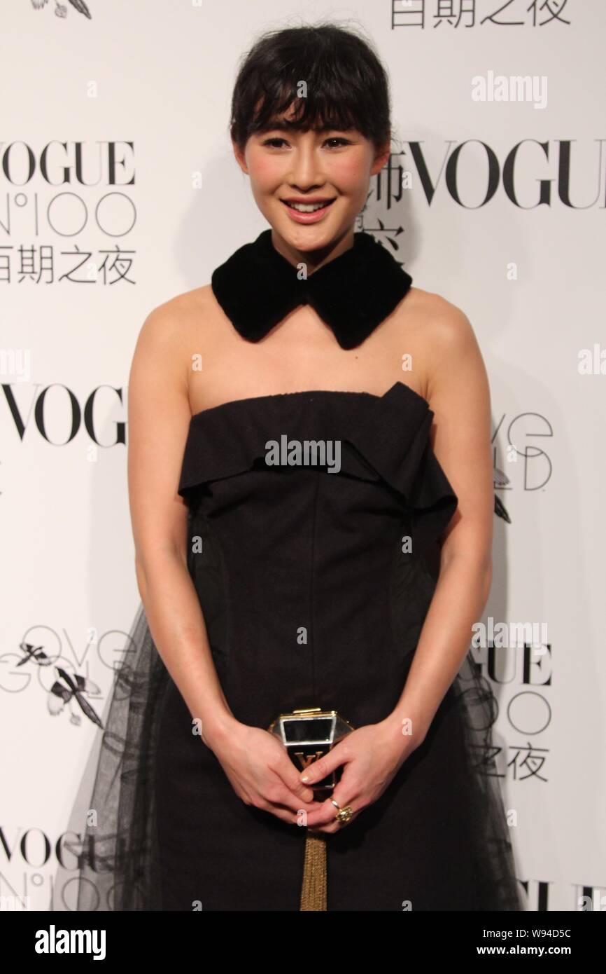 Modèle chinois Chen Ran pose au cours de la 100e anniversaire partie Vogue à Beijing, Chine, 12 novembre 2013. Banque D'Images