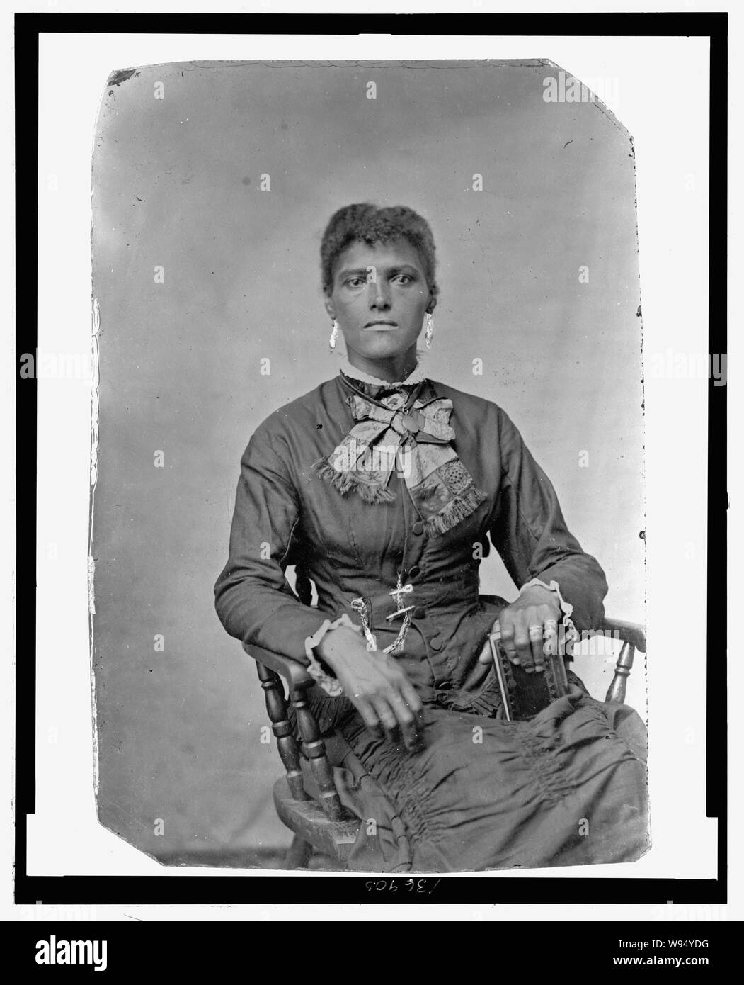 African American Woman, assis Banque D'Images