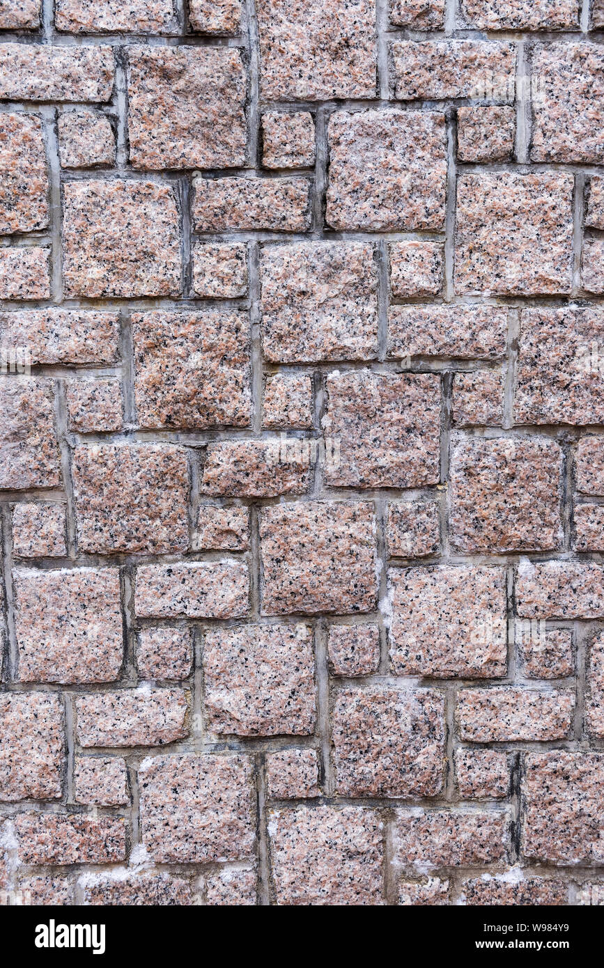 Résumé Contexte La texture de Pierre mur de clôture, l'architecture et de décoration Accueil Jardinage Design architectural, de l'extérieur des murs de granit Banque D'Images