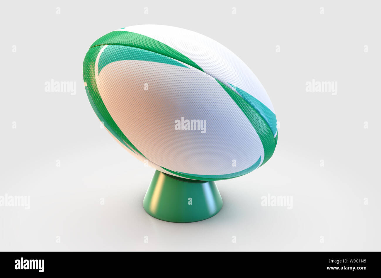 Une texture blanc ballon de rugby avec un modèle de conception verte reposant sur un livre vert sur un tee kicking isolé sur fond blanc - 3D render Banque D'Images