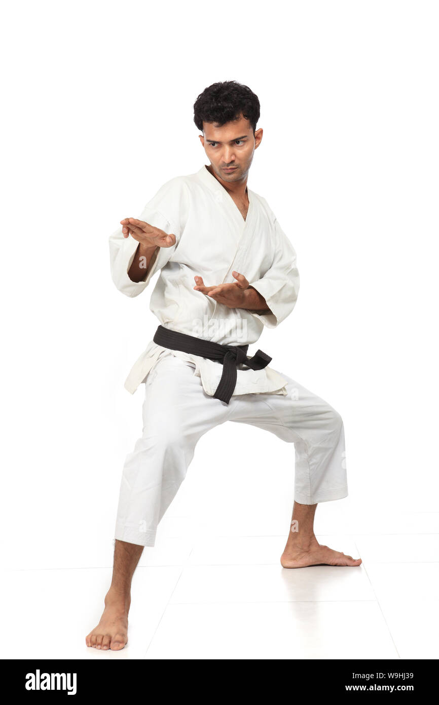 Jeune homme en position de judo Banque D'Images