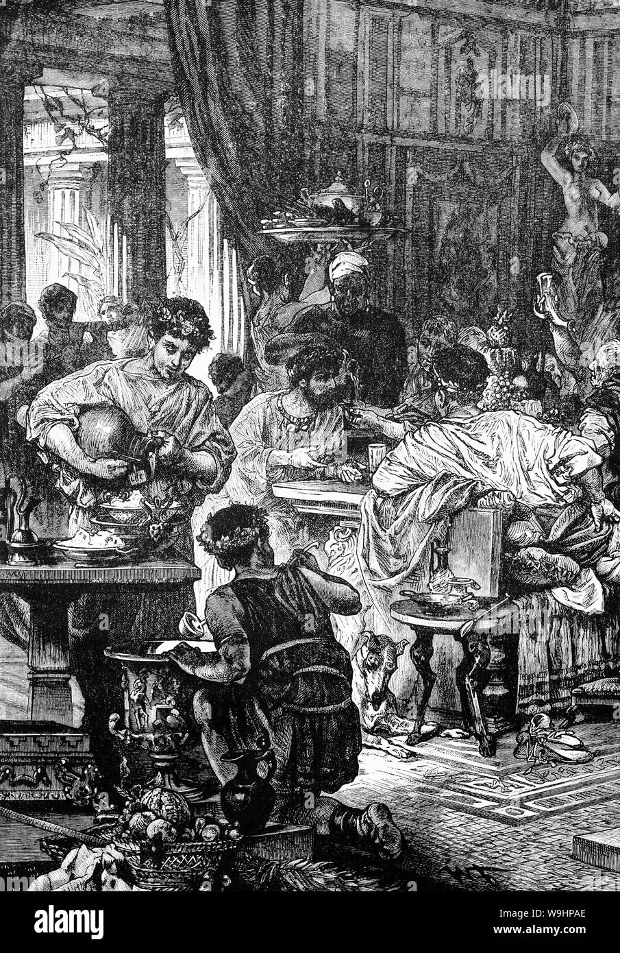 Un banquet romain du 1er siècle de notre ère dans la salle à manger,  également appelé "triclinium" dans la maison de riches Romains appelé  'Domus'. Début dans la soirée, il y avait