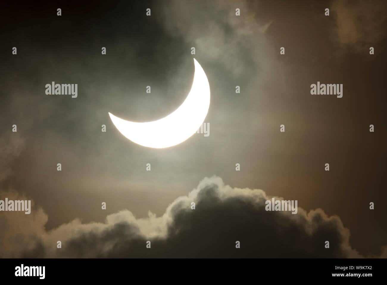 La phase partielle de l'éclipse totale du soleil le 13 novembre 2012 de Palm Cove, Cairns, Queensland du Nord, Australie, Pacifique Banque D'Images