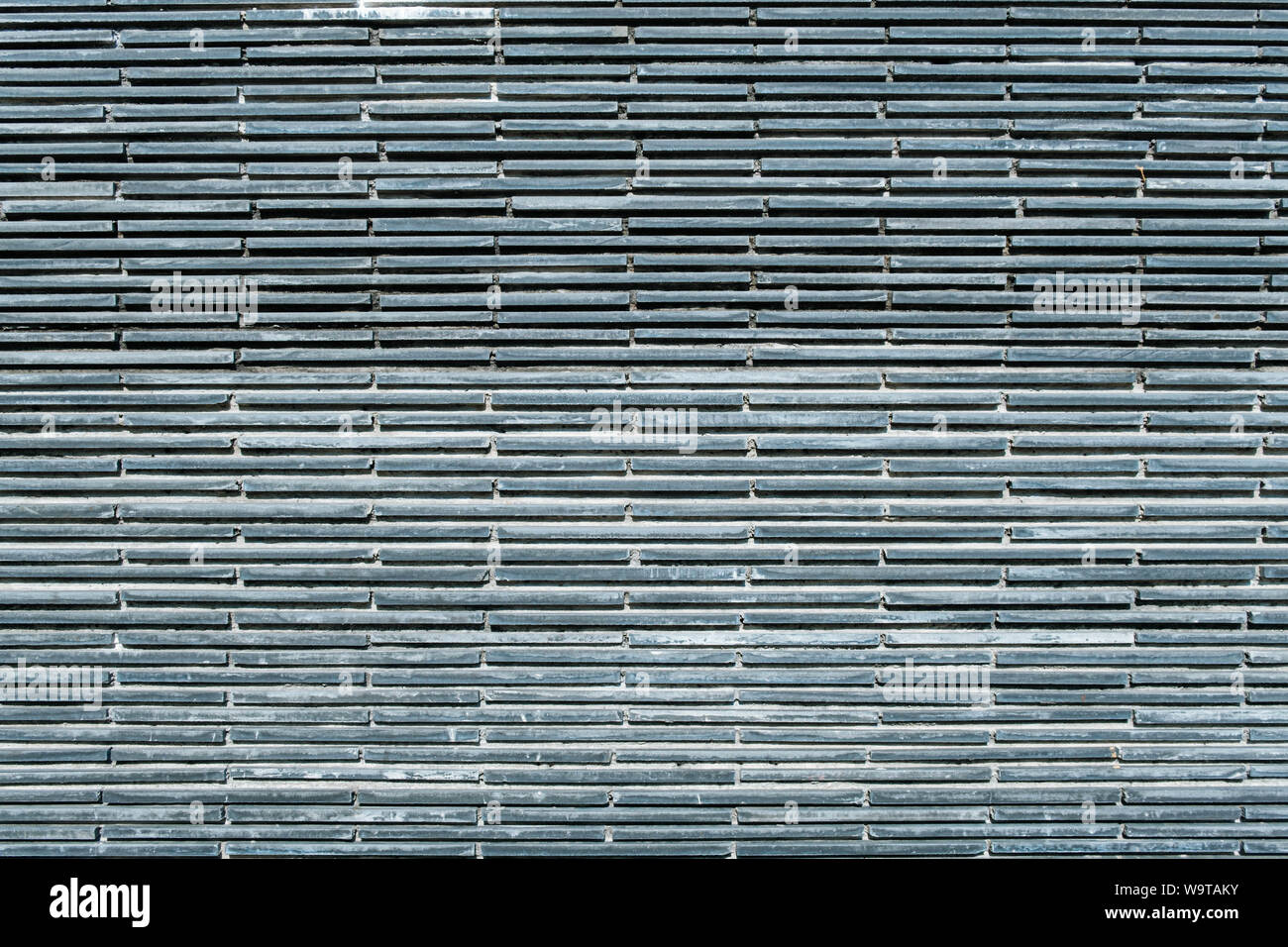 Ressources graphiques texture mur de briques gris background Banque D'Images