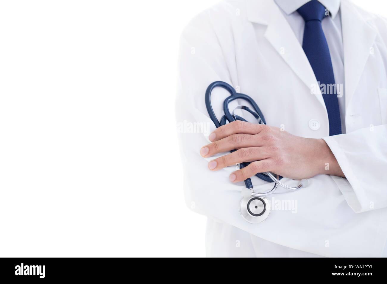 Doctor holding stethoscope, close-up. Banque D'Images