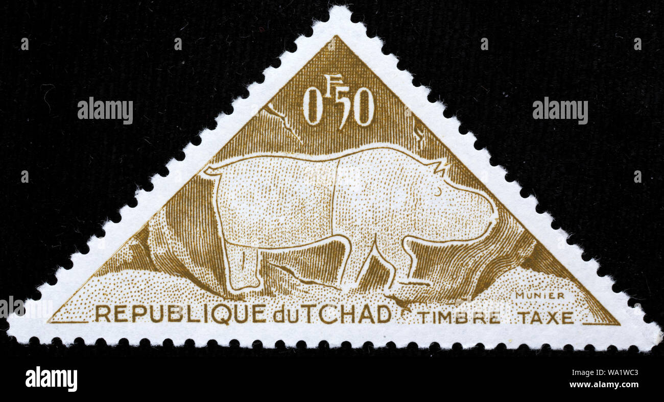 Les rhinocéros d'Afrique, l'art pré-historiques, timbre-poste, Tchad, 1962 Banque D'Images