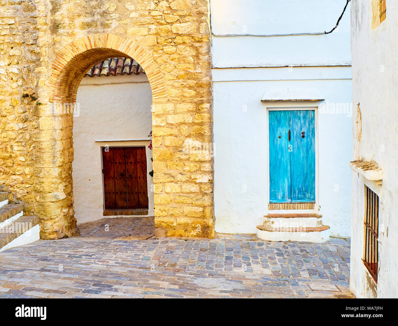 L'arc de la porte fermée, Arco de la Puerta Cerrada, dans le quartier juif de Vejer de la Frontera centre-ville. La province de Cádiz, Andalousie, espagne. Banque D'Images
