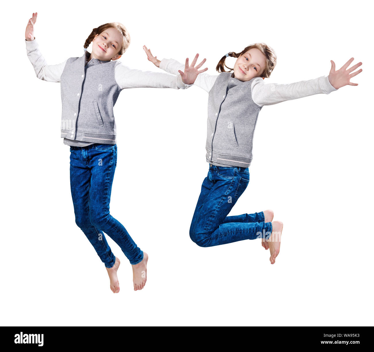 Collage of cute smiling little girl sauter de haut. Isolé sur blanc. bckground Banque D'Images