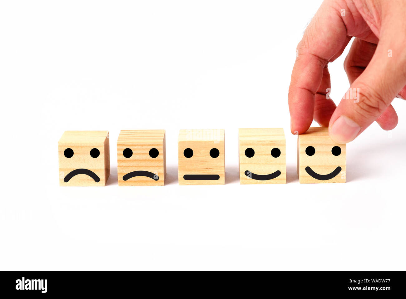 L'évaluation du service à la clientèle et de satisfaction survey concept avec la main humaine. Banque D'Images