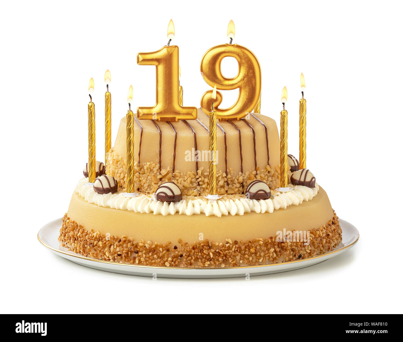 Gâteau de fête avec des bougies d'or - Numéro 19 Banque D'Images