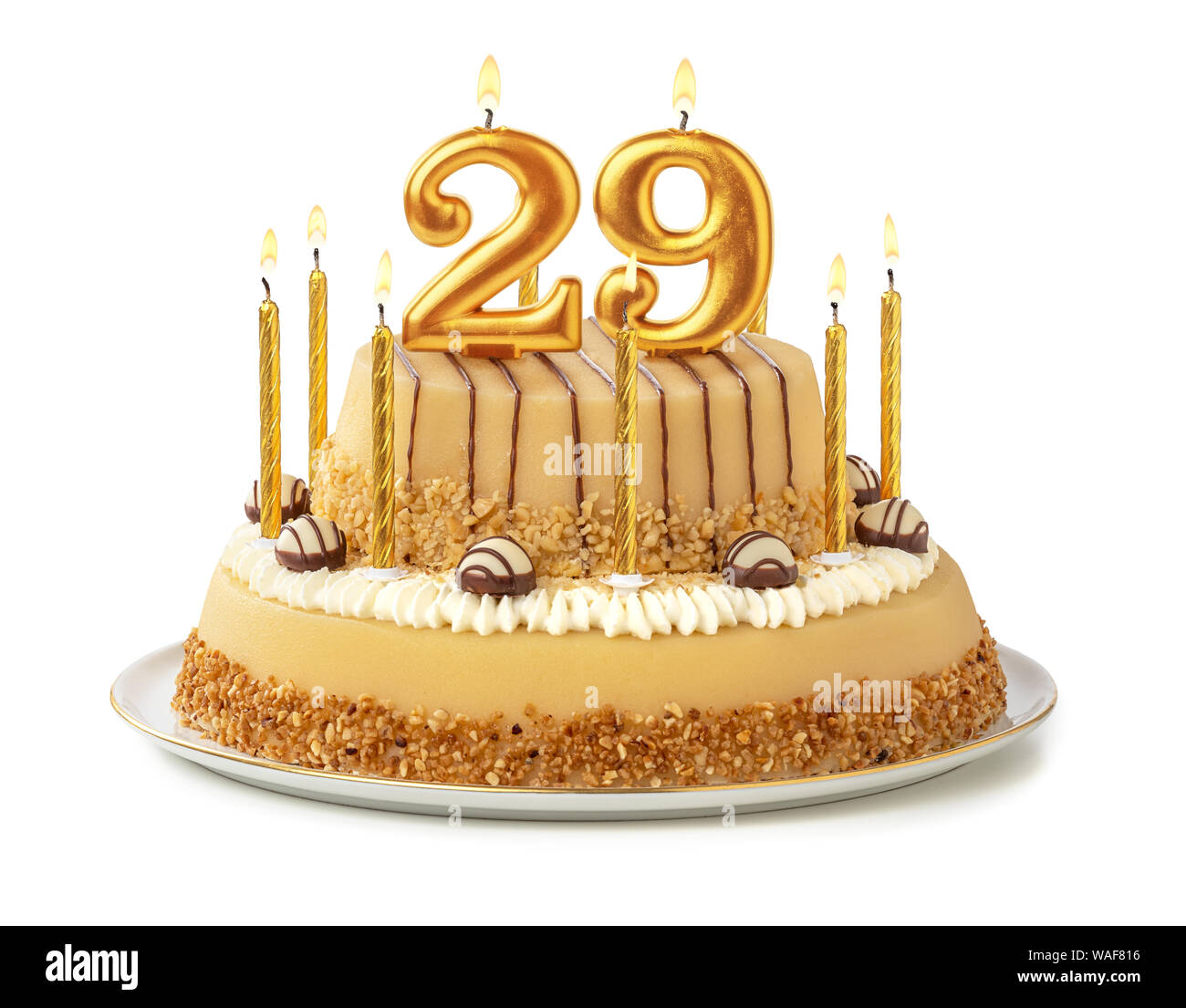 Gâteau de fête avec des bougies d'or - Numéro 29 Photo Stock - Alamy