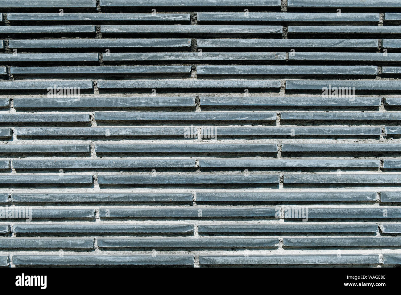 Ressources graphiques texture mur de briques gris fond bloc Banque D'Images