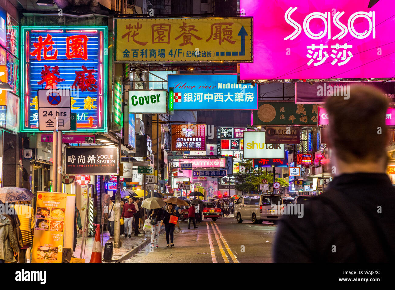 Scène de rue de nuit, Kowloon, Hong Kong, Chine. Banque D'Images