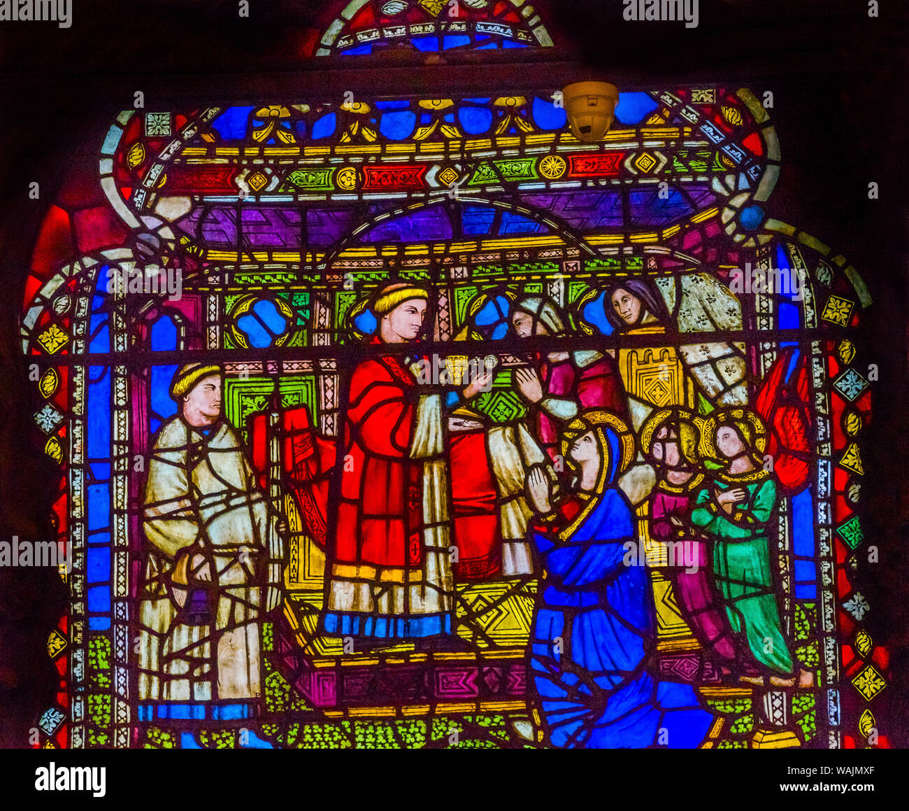 Vierge Marie et prêtre, vitrail, église Orsanmichele, Florence, Italie. Eglise et vitraux de 1400's. Banque D'Images